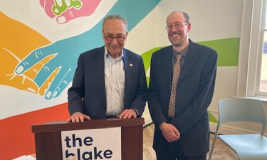 Sen. Schumer stands with NYS Mesonet Program Manager Jerry Brotzge at the Blake Annex.