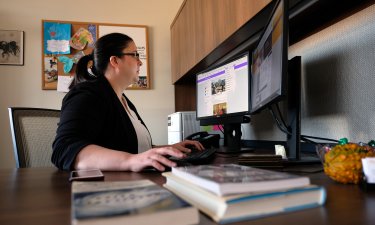 CEHC's Amber Silver monitors social media from her desk inside the Crisis Informatics Lab.