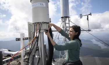 Sara Lance conducts cloud chemistry research from the top of ASRC's Whiteface Mountain Field Station.