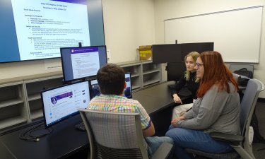 UAlbany VOST students gather for a debrief following the NYC Marathon.