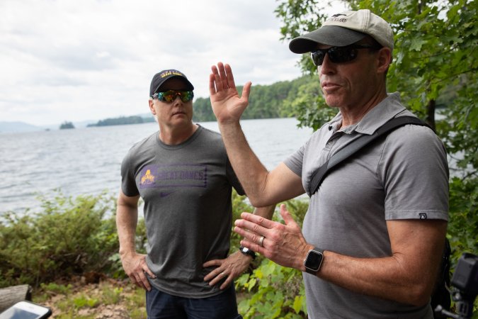 ASRC's Scott Miller and Jeff Freedman stop for a discussion during a research field campaign on Lake George.