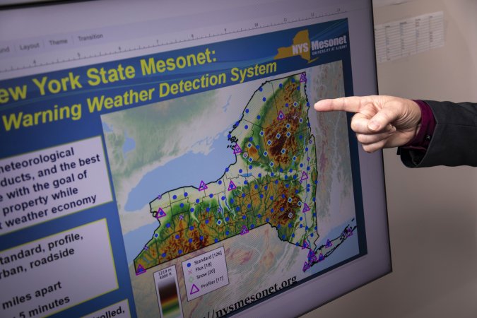 A finger points at a New York State Mesonet map.