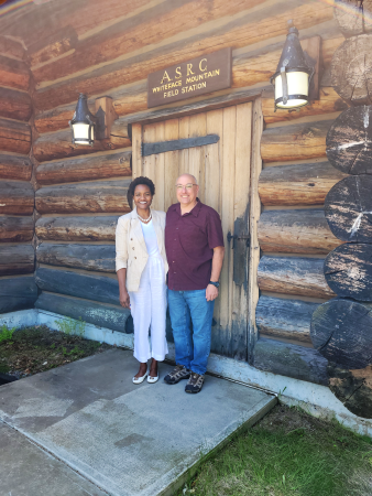 Nicole Hylton-Patterson and Mark Beauharnois stand in front of the Whiteface Mountain Field Station.