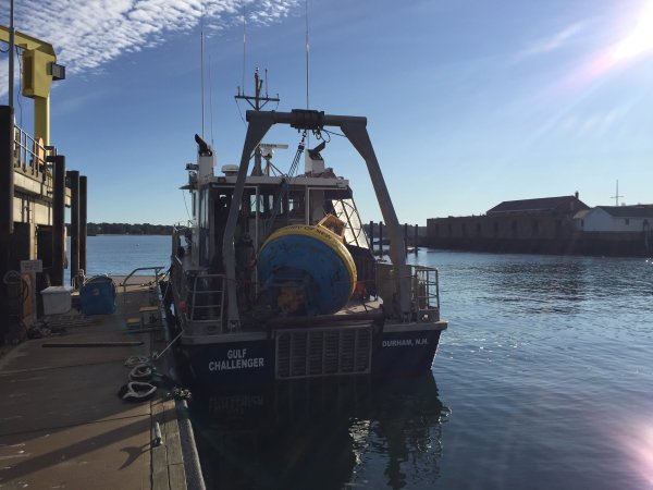 UNH's R/V Gulf Challenger transports a research buoy to the mooring location on the Gulf of Maine.
