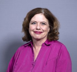 Dr. Weller smiles at the camera.