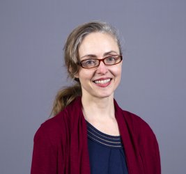 Dr. Emily Leckman-Westin smiles at the camera.