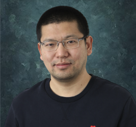 A portrait of Xin Wang.