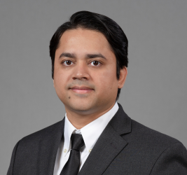 A portrait of Muntasir Masum.