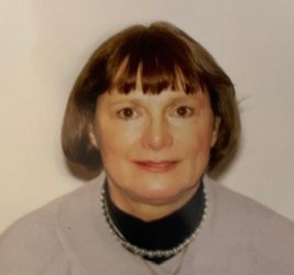 Dr. Dana Abbott smiling with white background