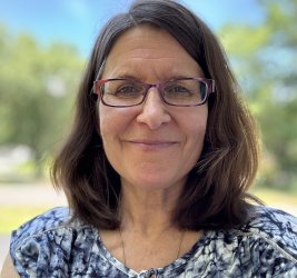 Dr. Heta-Maria Miller smiling outdoors