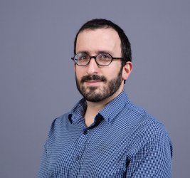 Dr. Rosenberg smiles at the camera.