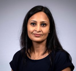 Pallavi smiles at the camera.