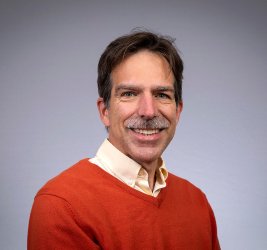 Todd smiles at the camera.