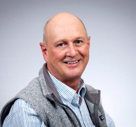 Keith smiles at the camera.