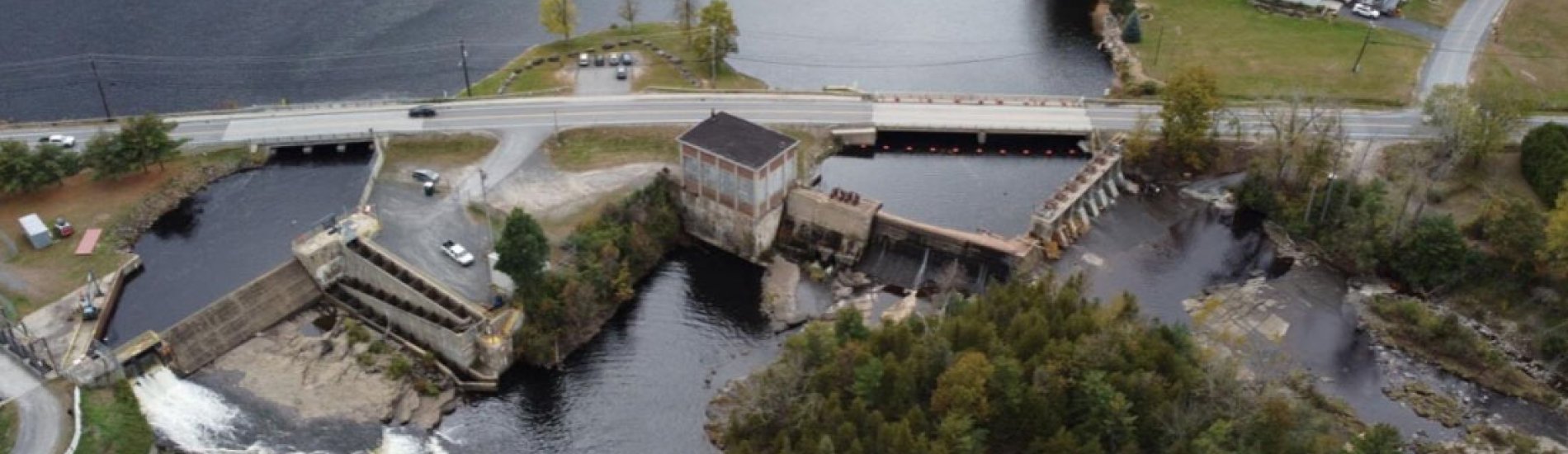 An image of a road and dam in Fulton and Clinton County in New York State.