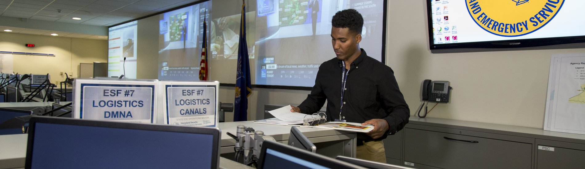 A student working at the New York State Homeland Security and Emergency Preparedness command center.