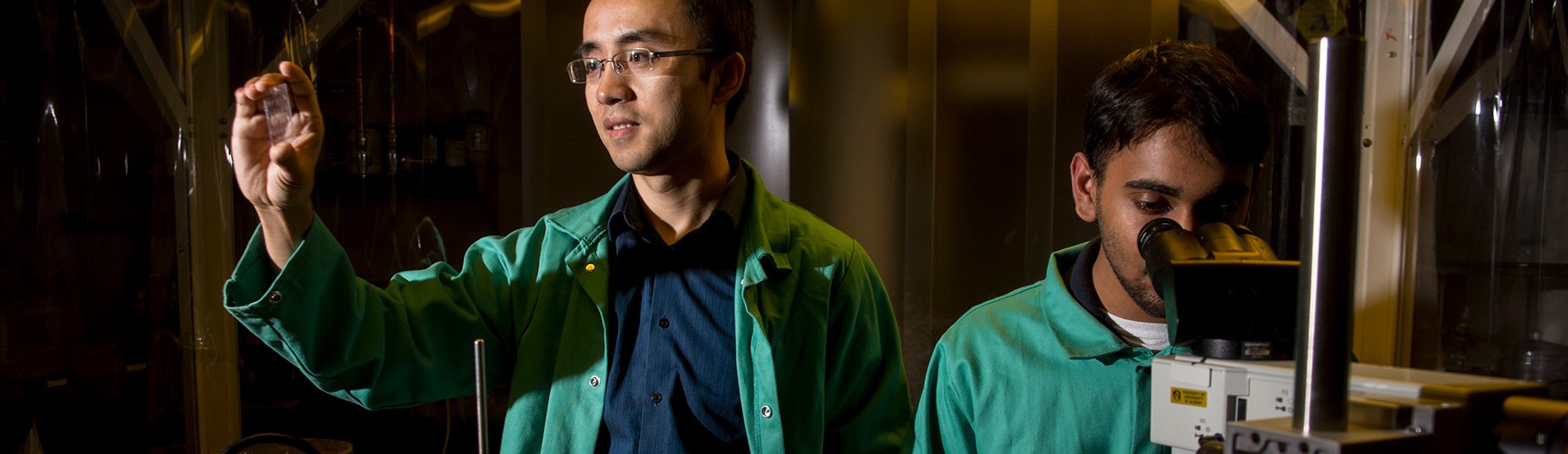Two researchers working in a UAlbany chemistry lab.