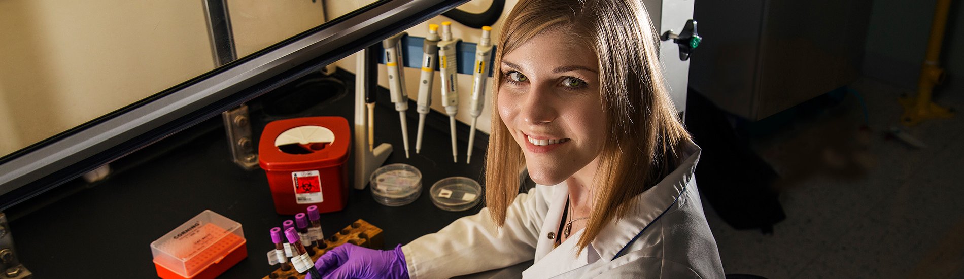 A student conducting research in a chemistry lab.