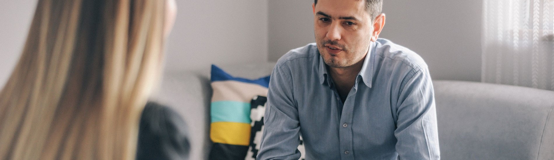 A substance abuse counselor meets with a client in her office.