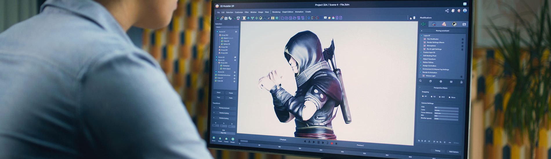 A video game designer works on a character model on a monitor.