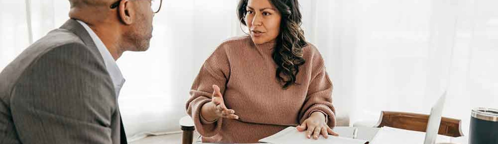 A human resources manager interviews a candidate for a position.