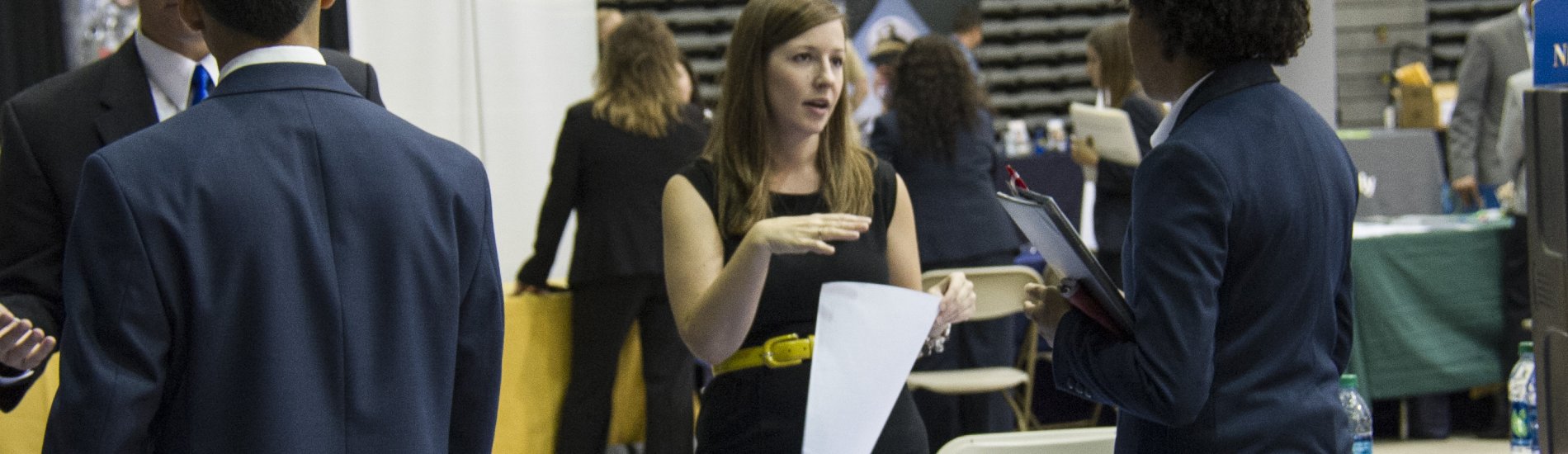 Employer speaking to student at School of Business Career Fair 