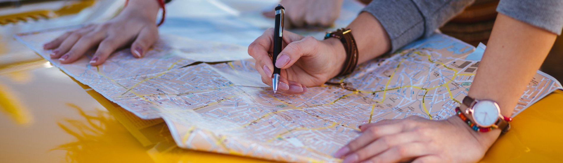 Student reviewing a street map