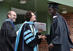 Jukoski congratulates a recent Mitchell College Graduate