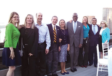 Group photo on rooftop in Boston