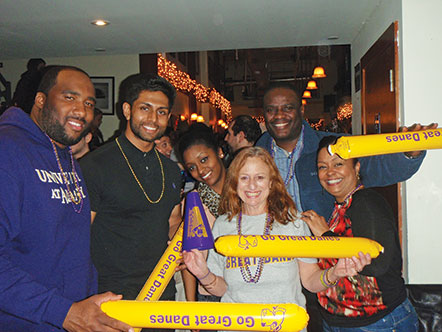 Alumni cheer on Great Danes men's basketball at NCAA tournament