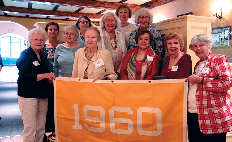Class of 1960 holds their class banner