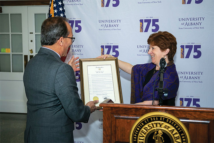 President Rodriguez and Mayor Sheehan with proclamation.