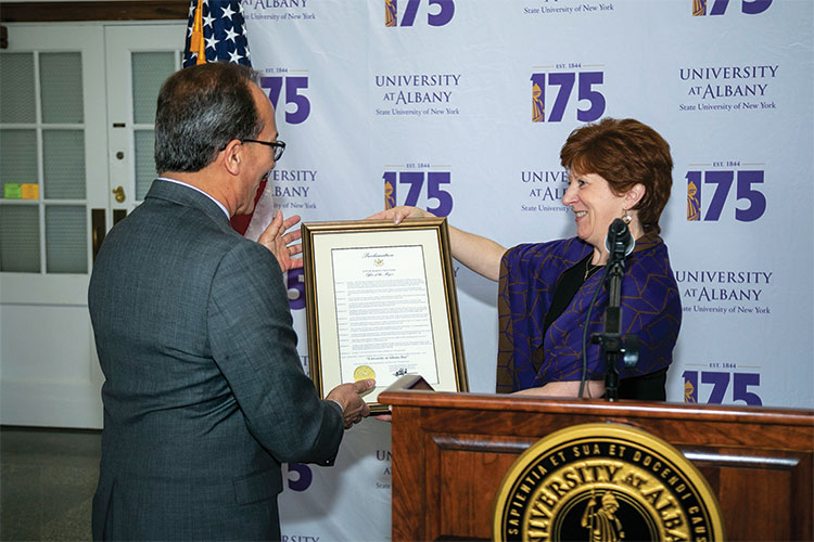 President Rodriguez and Mayor Sheehan with proclamation.