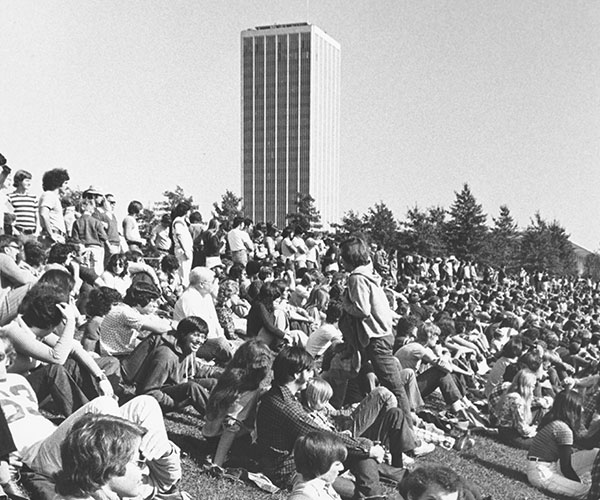 Crowd of students at football game.