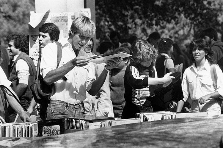 Students look through records.