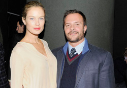Bart poses with supermodel Carolyn Murphy