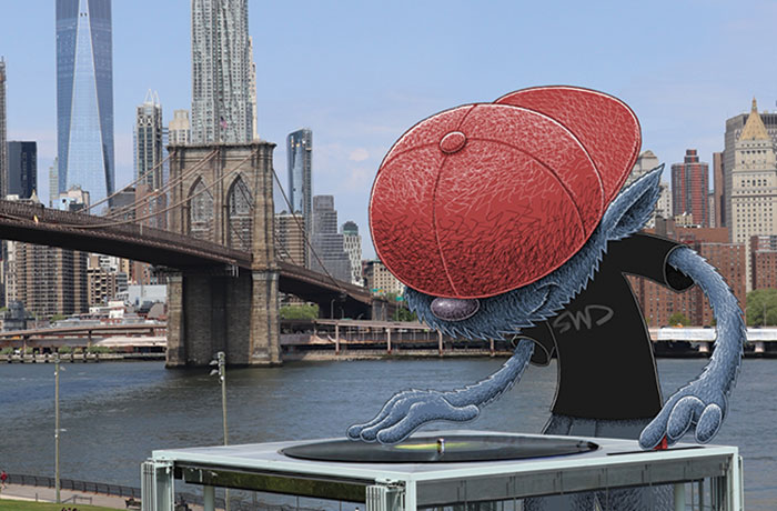 Blue monster doodle works a turntable on top of a carousel in New York City