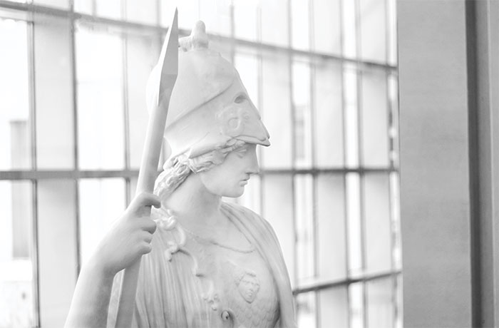 Minerva statue in front of window