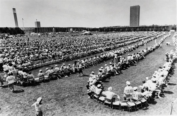 A game of musical chairs is played on the lawn at UAlbany