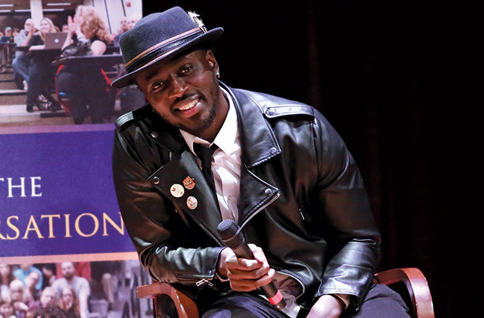 Nana Kwame Adjei-Brenyah on stage at a UAlbany event