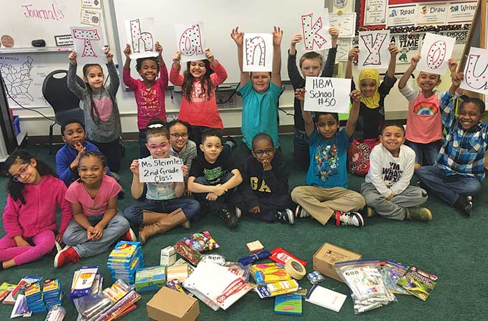 Students thank Pencils & Paper for their school supplies.