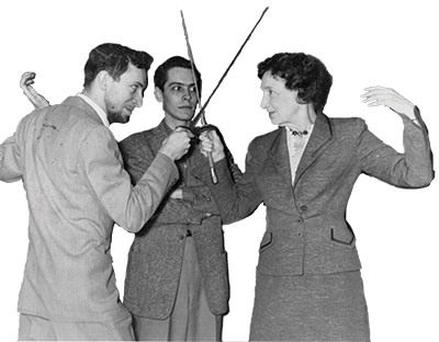 Futterer and student duel in a theatre production