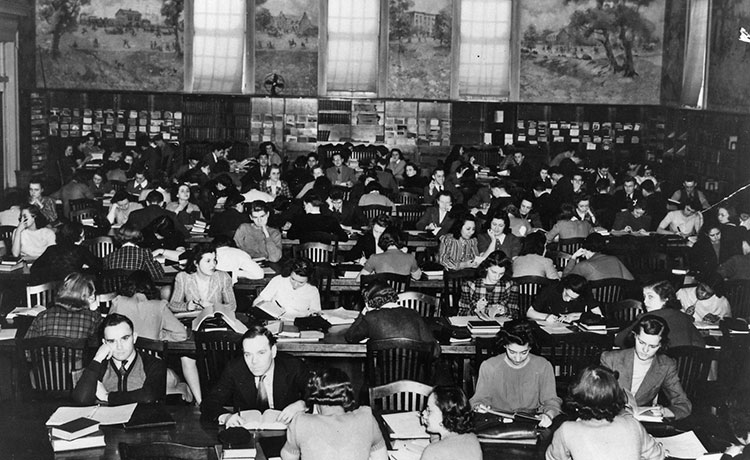 black and white photo of students studying in Hawley Library in 1940