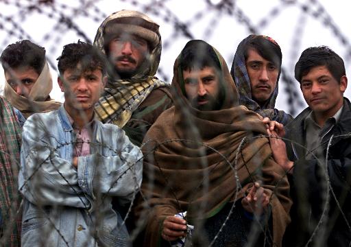 Photo of Afghan men from the AP Photo Archive.